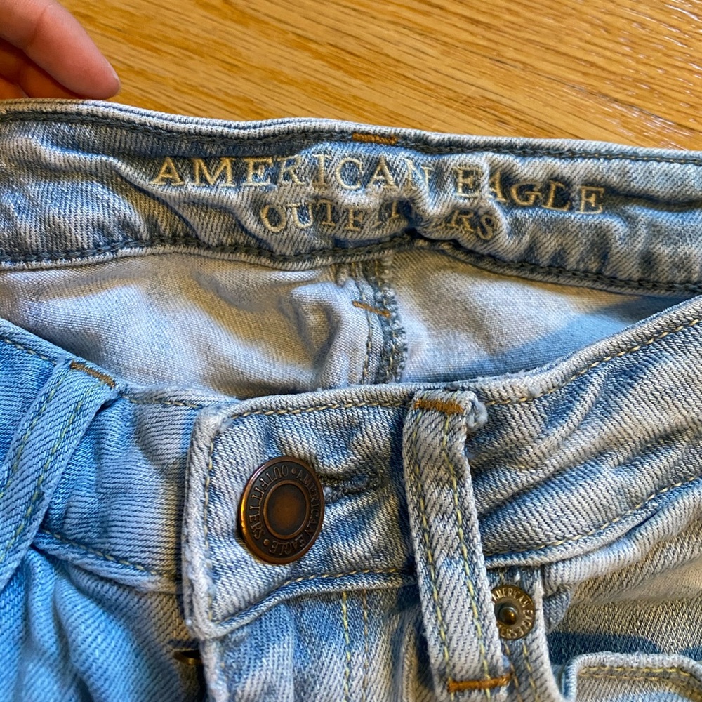 Light Washed Ripped Jeans - Picture 3 of 6